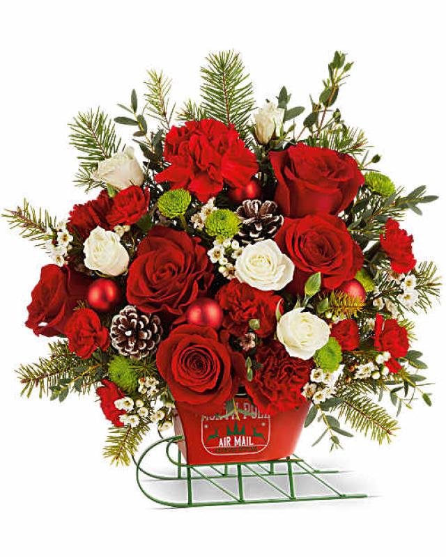 An image of Teleflora's North Pole Sleigh Bouquet Standard