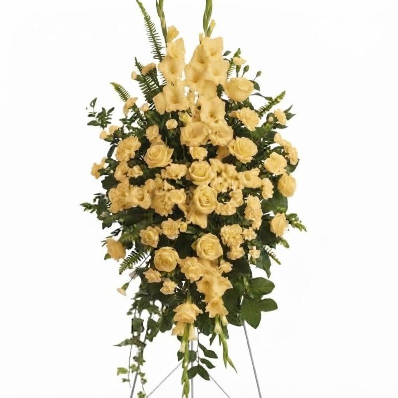 An image of Teleflora's Deep in Our Hearts Standing Spray Lavender Standard